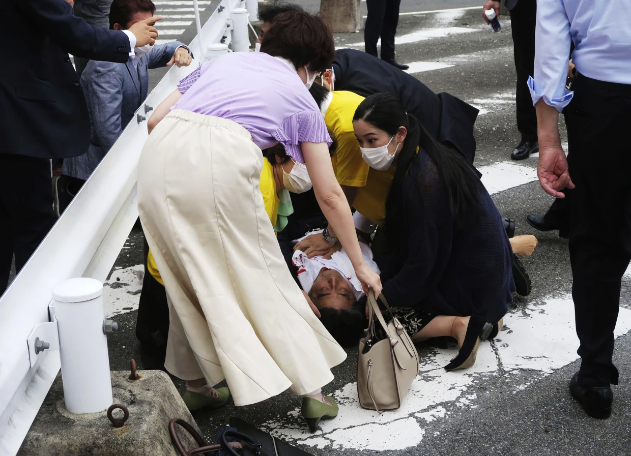 shinzo Abe laying on ground after he was shot
