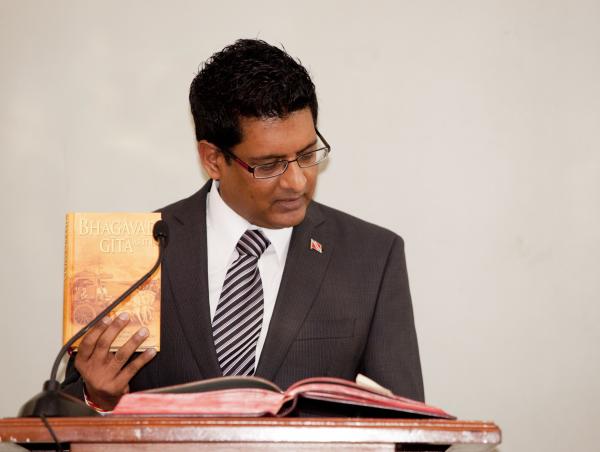 Newly appointed Minister of Transport, Senator the Honourable Devant Maharaj as he takes the Oath of Office at the Swearing In Ceremony at Knowsley, June 27, 2011.