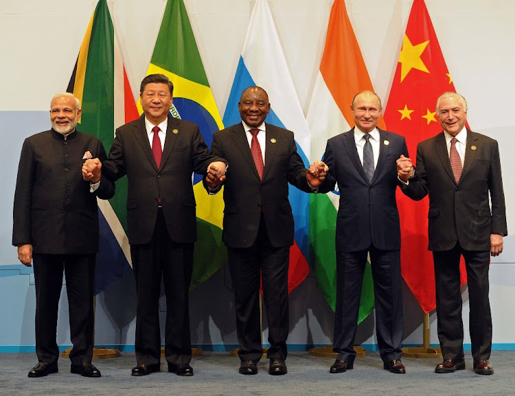 Dedollarize Trinidad and Tobago by Joining BRICS